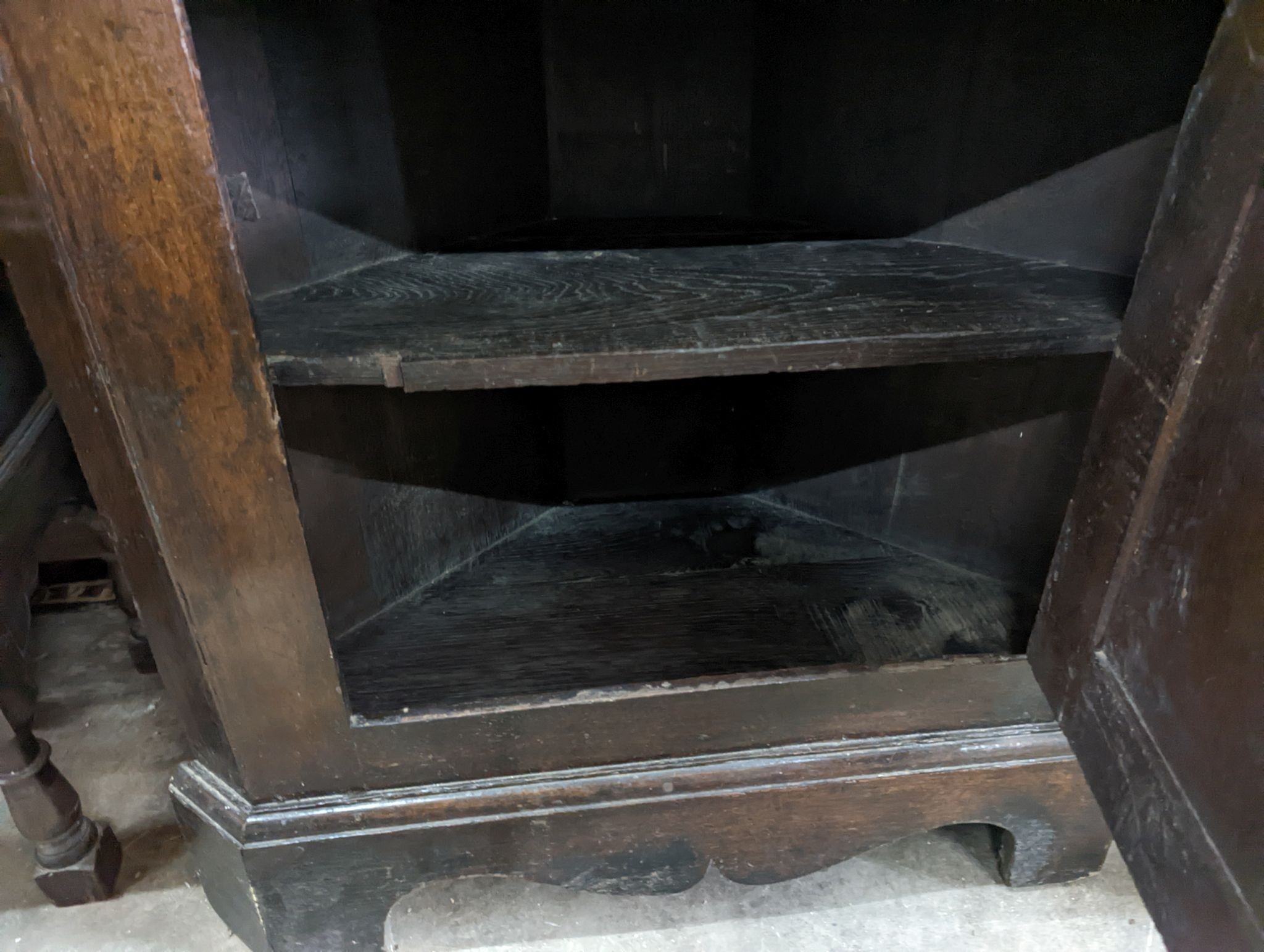 A George III oak standing corner cabinet, width 94cm, depth 38cm, height 202cm